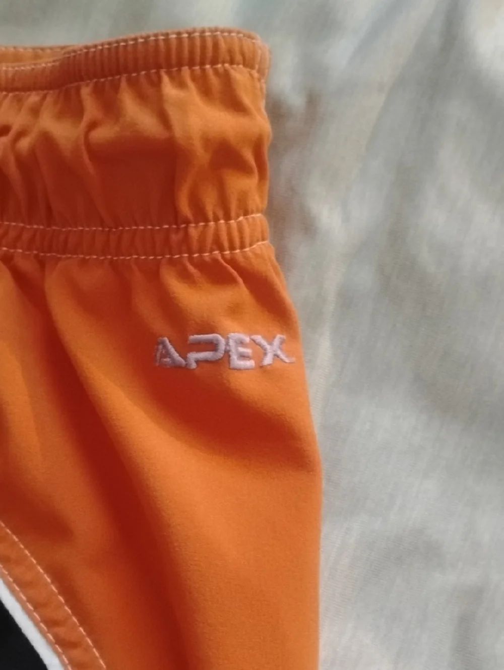 The North Face Orange Men's Swim Board Shorts with Zip Pocket